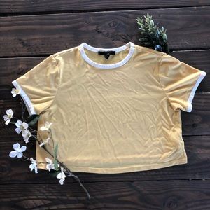 Yellow cropped top with white trim